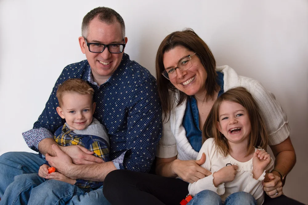 The Vance family smiling together